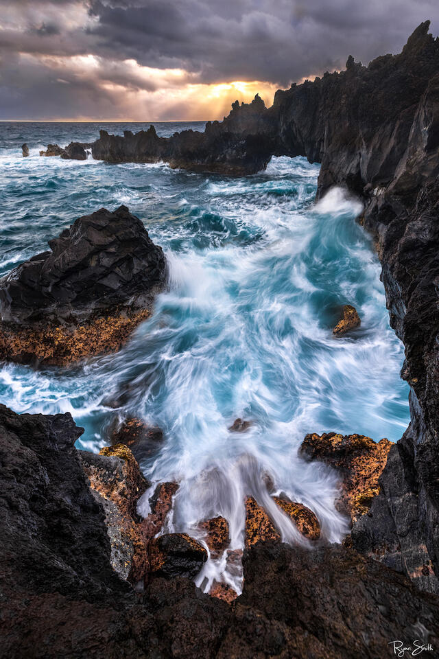 Maui's enchanting waters and black lava rock are a perfect scene for bringing the beauty of Outside in