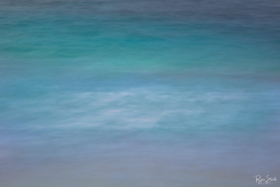 Abstract photography of the Hawaiian waters close up shows the many gorgeous shades of turquoise, blue, white and tan that all come togethers seamlessly.